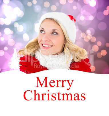 Composite image of happy festive blonde