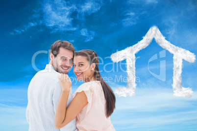 Composite image of attractive young couple smiling at camera