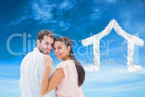 Composite image of attractive young couple smiling at camera