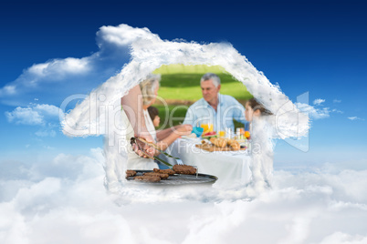 Composite image of barbecue grill with extended family having lu
