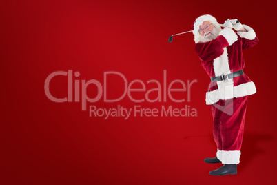 Composite image of santa playing golf