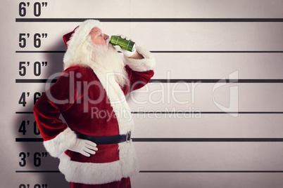 Composite image of father christmas drinks beer with closed eyes