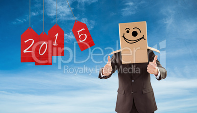 Composite image of anonymous businessman with thumbs up