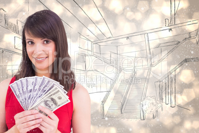 Composite image of brunette showing fan of dollars