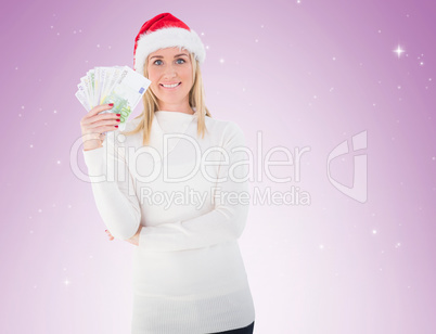 Festive blonde holding her cash