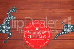 Composite image of banner and logo saying merry christmas