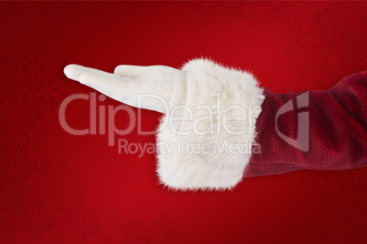 Composite image of santa claus shows open hand