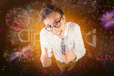 Composite image of young geeky businessman showing thumbs up