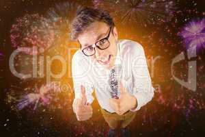 Composite image of young geeky businessman showing thumbs up