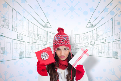 Composite image of festive brunette in winter clothes showing gi