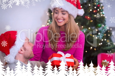 Composite image of sitting couple giving each other presents