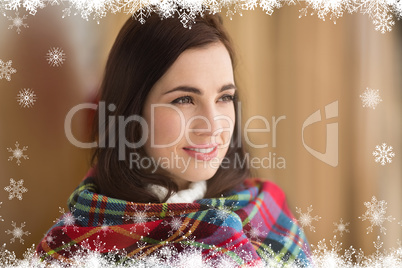 Composite image of portrait of a pretty brunette with cover