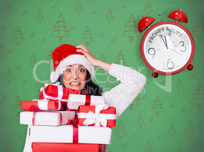 Composite image of shocked woman with christmas presents