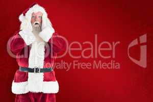 Composite image of santa is shocked to camera