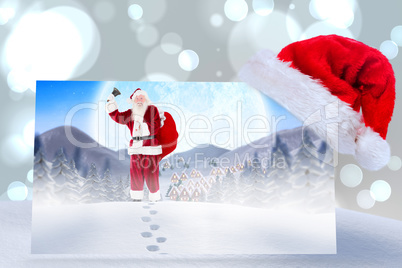 Composite image of santa delivery presents to village