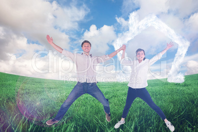 Composite image of couple jumping and holding hands