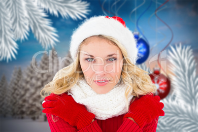 Composite image of happy festive blonde