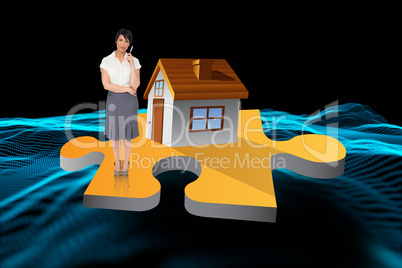 Composite image of businesswoman holding pen