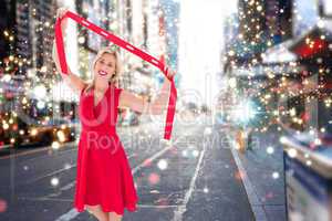 Composite image of stylish blonde in red dress holding scarf