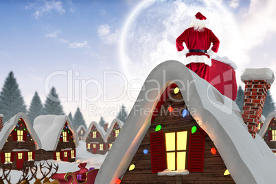 Composite image of santa with sack of gifts