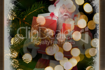 Composite image of santa carries a few presents