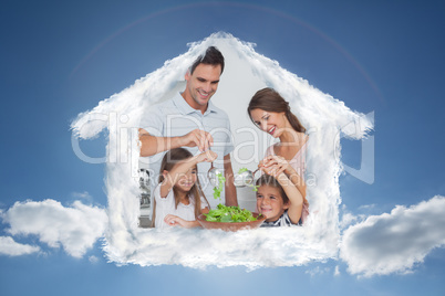 Composite image of family mixing a salad together