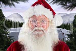 Composite image of santa smiles in the camera