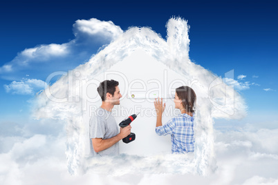 Composite image of man and his wife doing diy together