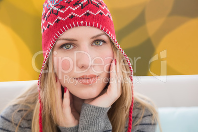 Composite image of woman wearing hat