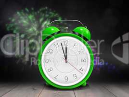 Composite image of alarm clock counting down to twelve