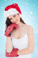 Composite image of beauty brown hair in boxing gloves