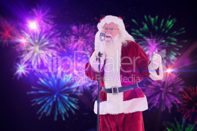 Composite image of santa sings like a superstar