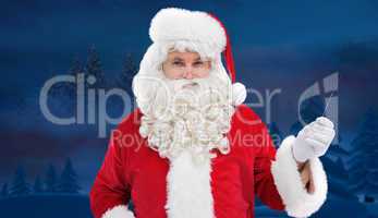 Composite image of portrait of perplexed santa holding