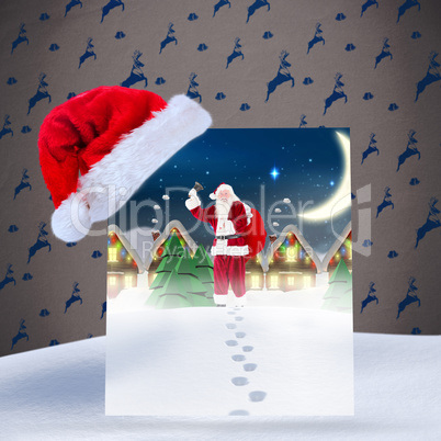 Composite image of santa delivery presents to village