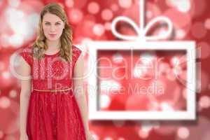 Composite image of beautiful woman wearing red dress smiling at