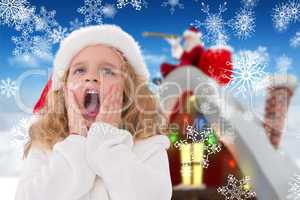 Composite image of festive little girl with hands on face