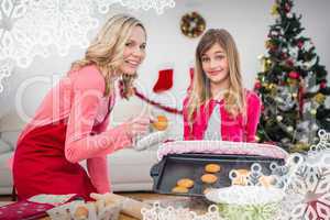 Composite image of festive mother and daughter making christmas