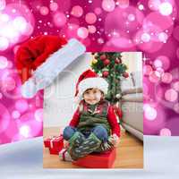 Composite image of cute festive little boy smiling at camera