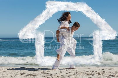 Composite image of woman sitting on man back and having fun