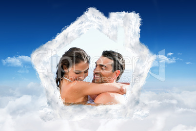 Composite image of couple hugging in the pool