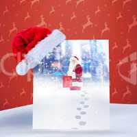 Composite image of santa hat on poster