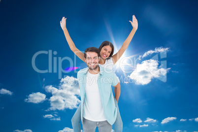 Composite image of happy casual man giving pretty girlfriend pig