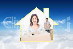 Composite image of pretty woman holding boxes in her new house
