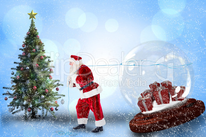 Composite image of santa pulling snow globe of presents