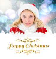 Composite image of happy festive blonde