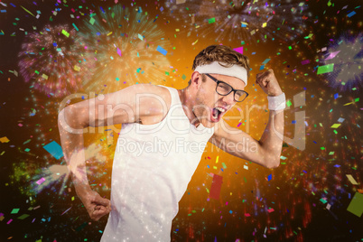 Composite image of geeky hipster posing in sportswear