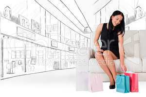 Composite image of woman sitting with shopping bags