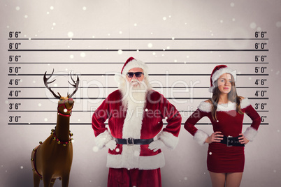 Composite image of santa claus wears black sunglasses