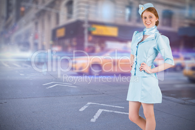 Composite image of pretty air hostess with hand on hip