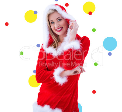 Composite image of festive blonde smiling at camera